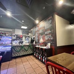 Interior, from a table facing the counter. Interior, from a table facing the counter.