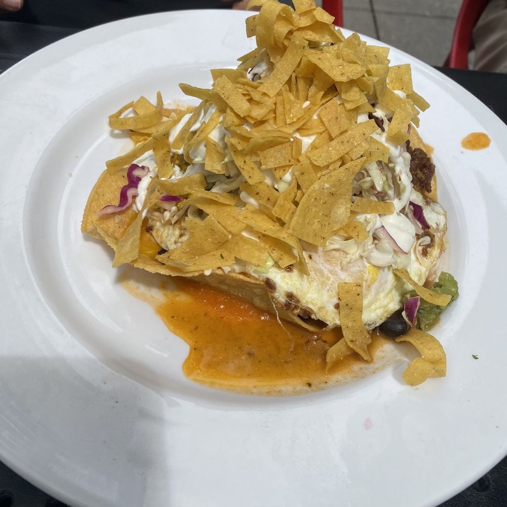 Toast - Huevos Rancheros ($17, $2 for chorizo) - corn tortillas, black beans, over-easy eggs, cotija, mexi slaw, guac, chipotle sauce, lime crema - Breakfast & Brunch Near Me - Birmingham, Michigan