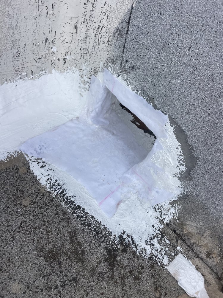 Slide of A Town Roofing