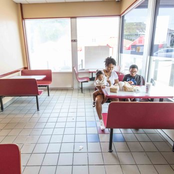 Ma's Donuts and More - a family sitting at a table - Donuts Near Me - Middletown, Rhode Island Ma's Donuts and More - a family sitting at a table - Donuts Near Me - Middletown, Rhode Island