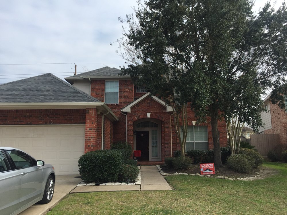 Slide of Solutions Roofing and Building