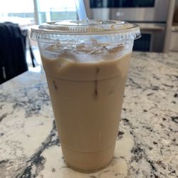 Balanced - Hazelnut Cold Brew with a splash of half and half snd oat milk.