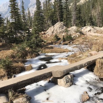 Emerald Lake - Bridge crossing on the way to Emerald Lake - This part of the lake was frozen over - Hiking Near Me - Estes Park, Colorado Emerald Lake - Bridge crossing on the way to Emerald Lake - This part of the lake was frozen over - Hiking Near Me - Estes Park, Colorado