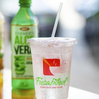 Fusabowl - a glass of soda and a bottle of soda - Asian Fusion Near Me - Cincinnati, Ohio