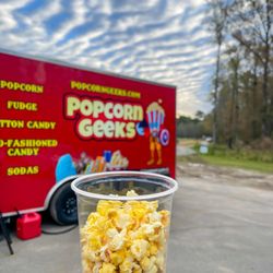 Popcorn Geeks - Butter at the top, caramel at the bottom. This is their food truck which serves the same deliciousness as is in the store!