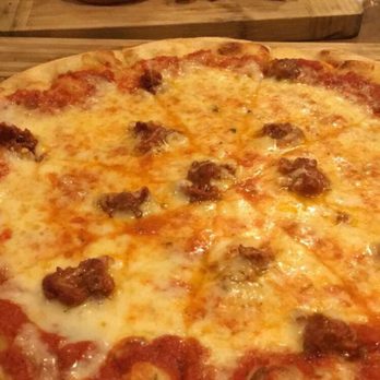 Pub Americana - Three cheese with spicy Italian sausage. - Bars Near Me - Cocoa, Florida Pub Americana - Three cheese with spicy Italian sausage. - Bars Near Me - Cocoa, Florida