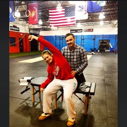 On Point Chiropractic - Dr. K performing myofascial release on a CrossFit TriTown member.