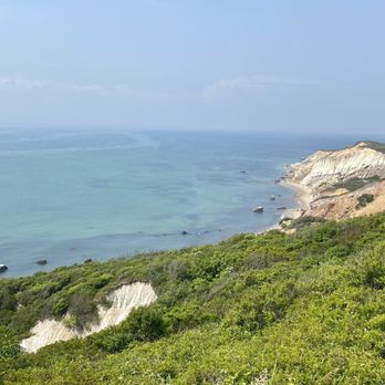 Aquinnah Cliffs Overlook - 06.09.23 Aquinnah red clay cliffs - Local Flavor Near Me - Aquinnah, Massachusetts Aquinnah Cliffs Overlook - 06.09.23 Aquinnah red clay cliffs - Local Flavor Near Me - Aquinnah, Massachusetts