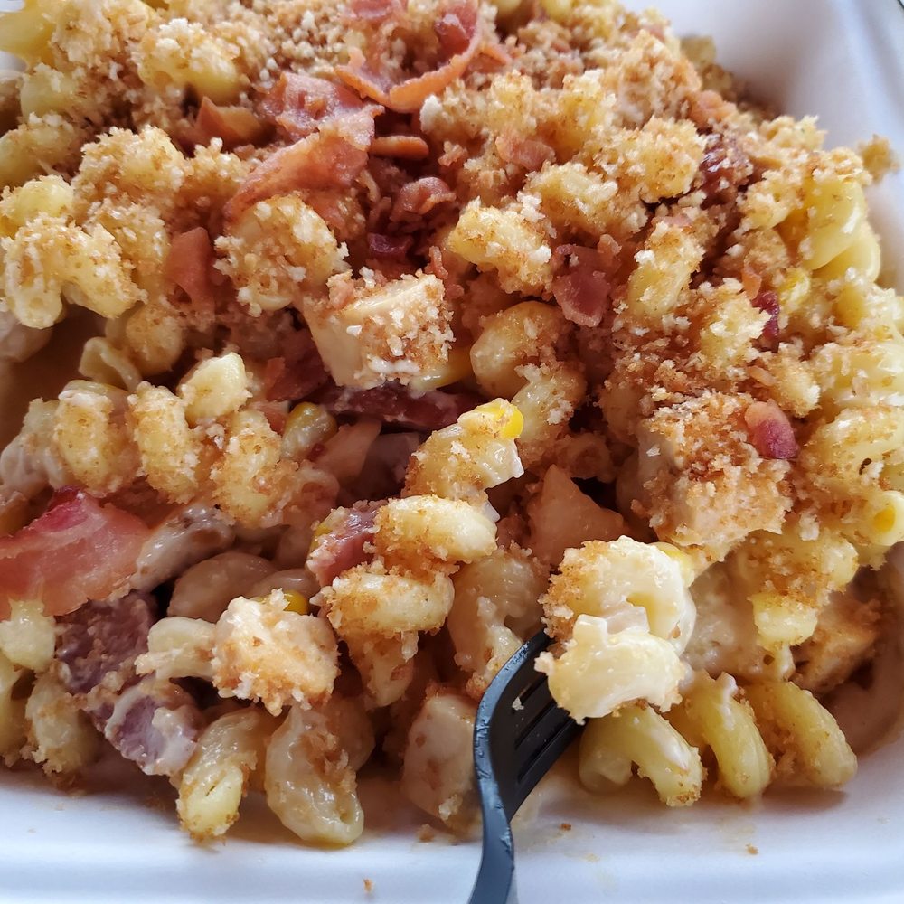 Smokey chicken mac and cheese with kielbasa and bacon topped with pablo breadcrumbs. Smokey chicken mac and cheese with kielbasa and bacon topped with pablo breadcrumbs.