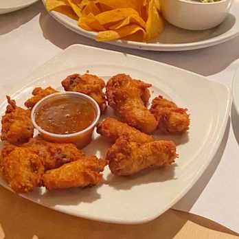 Rick's Club American - Chicken Wings and Baked Spinach And Artichoke Dip with chips - American Near Me - Congers, New York Rick's Club American - Chicken Wings and Baked Spinach And Artichoke Dip with chips - American Near Me - Congers, New York