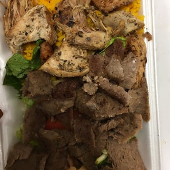 Uncle Gussy's - combo platter (chicken + gyro w/ garden salad over yellow rice) - Food Trucks Near Me - New York, New York Uncle Gussy's - combo platter (chicken + gyro w/ garden salad over yellow rice) - Food Trucks Near Me - New York, New York