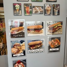 a variety of food items displayed on a refrigerator