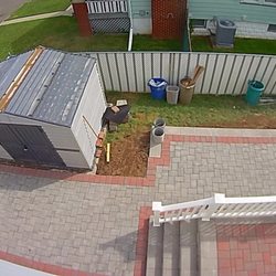 Los Cuates Landscaping - New porch, steps, railing, and pavers.