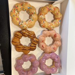 Mochinut - Two pineapple, two blueberry, one strawberry cream, and one coffee mochinuts