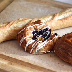 White Lotus Farms - Coffee Cream Croissant ($4), Blueberry Cream Cheese Danish ($4), Baguette ($4)