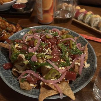 Lake & Irving - Poke nachos ($18). Ahi, poke sauce, wakame salad, cilantro lime aioli, unagi glaze, pickled red onion, pickled jalapeño, sesame. - New American Near Me - Minneapolis, Minnesota
