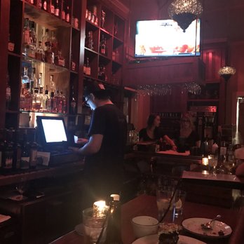 Moonshine Grill - This is the bar area. There is also an outside bar. We like the inside better . - Southern Near Me - Austin, Texas