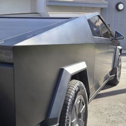 Cybertruck with Xpel prime XR plus window tinting, satin black Xpel colored PPF and full fusion plus satin ceramic coating.