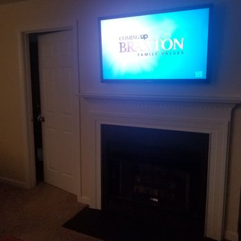 Magic TV Mount - TV mounted above fireplace - Home Theatre Installation Near Me - Chantilly, Virginia