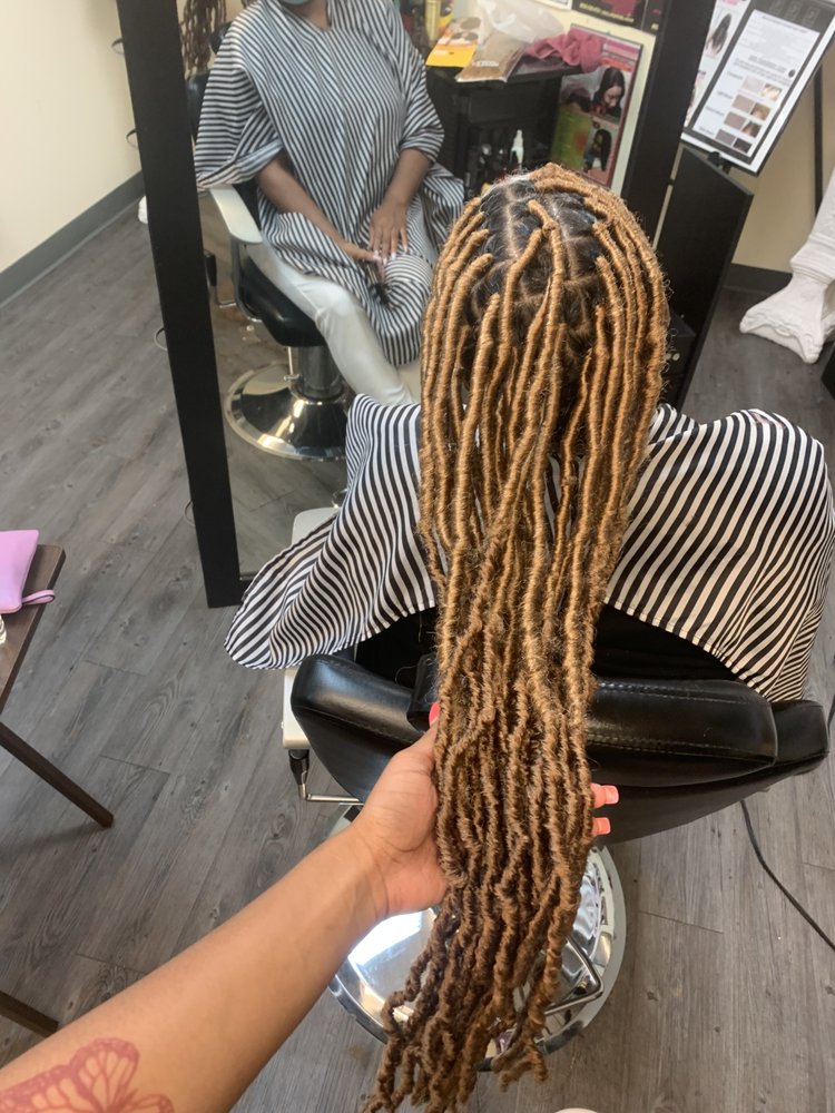 Braids by Mya Lynee Logo