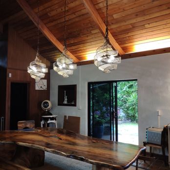 VIR Electric - 3 new dining room chandeliers installed above a custom river table. - Electricians Near Me VIR Electric - 3 new dining room chandeliers installed above a custom river table. - Electricians Near Me
