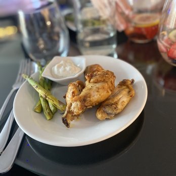Matthew May's Teaching Kitchen - A close-up shot of a white plate filled with seasoned chicken wings and asparagus. The chicken wings appear golden brown and ... - Cooking Schools Near Me - Virginia Beach, Virginia Matthew May's Teaching Kitchen - A close-up shot of a white plate filled with seasoned chicken wings and asparagus. The chicken wings appear golden brown and ... - Cooking Schools Near Me - Virginia Beach, Virginia