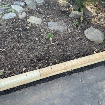 Cassella Design & Build - Wood trim. They paid such attention to detail that they even filled in the gap of my driveway with asphalt! - Landscaping Near Me - Springfield, Virginia Cassella Design & Build - Wood trim. They paid such attention to detail that they even filled in the gap of my driveway with asphalt! - Landscaping Near Me - Springfield, Virginia