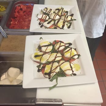 Avellino's - Seeing your salad made in front of you with fresh mozzarella by Orobianco - Pizza Near Me - Atlanta, Georgia