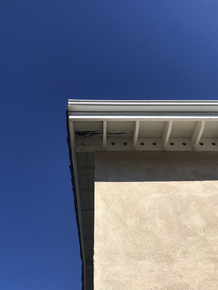 Slide of Freeman and Sons Roofing