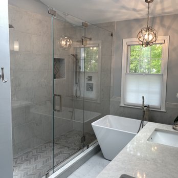 4K Group - a large bathroom with a walk in shower - General Contractors Near Me 4K Group - a large bathroom with a walk in shower - General Contractors Near Me