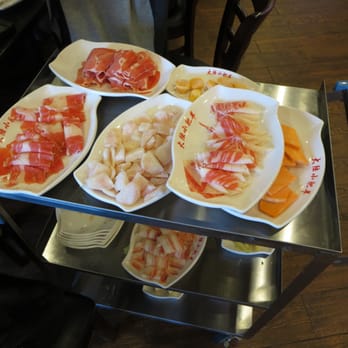 China Hot Pot - The different dishes you order are carted to your table. The different levels on the cart help save table space. - Mongolian Near Me - Atlanta, Georgia