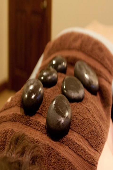 Nurturing Nature Massage Plus Logo