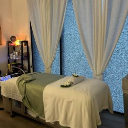 Salt and Sugar Massage & Head Spa - Massage bed, robe, and private room.