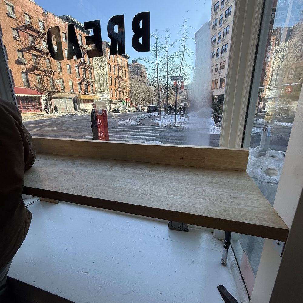 Elbow Bread - Large window to look outside as you sip your coffee and pretzel - Bakeries Near Me - New York, New York Elbow Bread - Large window to look outside as you sip your coffee and pretzel - Bakeries Near Me - New York, New York