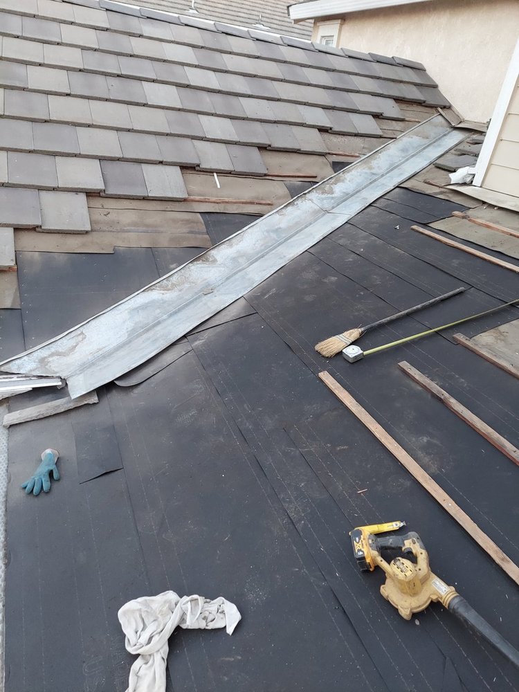 Slide of Landeros Roofing Solutions