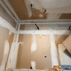Mike's Got it - The hole he broke in the drywall of my kitchen