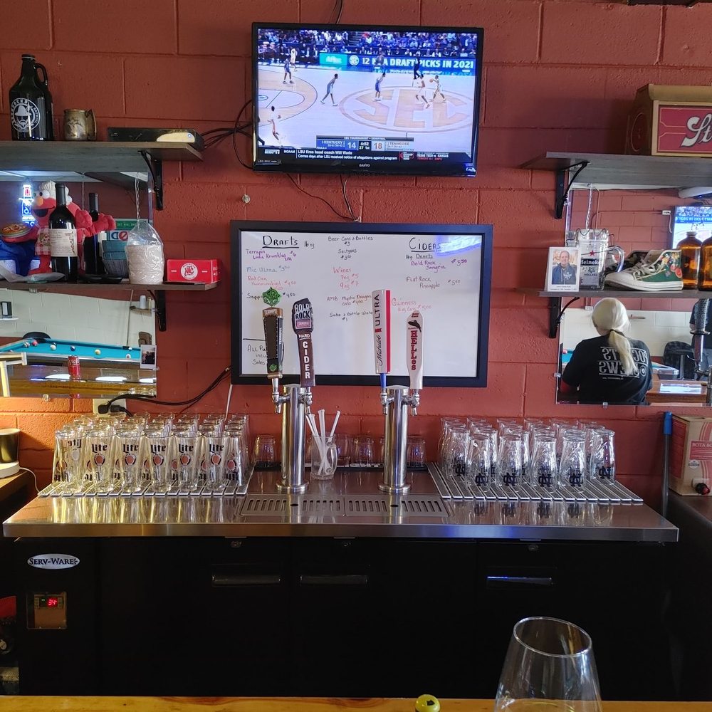 Pockets & Brews - a bar with wine glasses on the bar - Bars Near Me - Claremont, North Carolina Pockets & Brews - a bar with wine glasses on the bar - Bars Near Me - Claremont, North Carolina