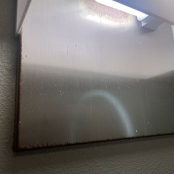 Mariposa Inn & Suites - rust all over light fixture. - Hotels Near Me - Monterey, California Mariposa Inn & Suites - rust all over light fixture. - Hotels Near Me - Monterey, California