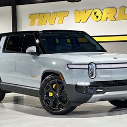 Rivian R1S Tints, PPF, ceramic coated and chrome delete Rivian R1S Tints, PPF, ceramic coated and chrome delete
