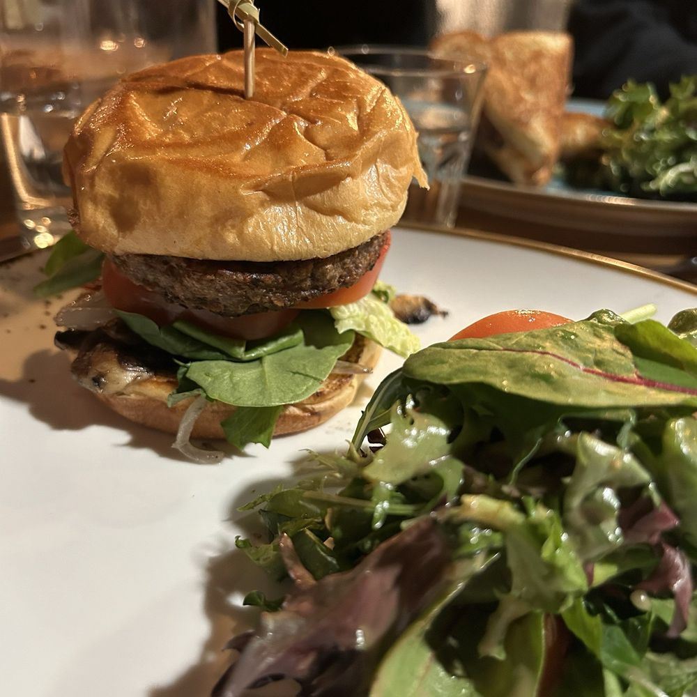 Veggie burger with side salad