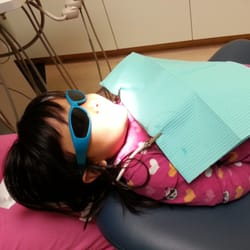 Third Street Dental - My daughter loving the sunglasses while getting her teeth cleaned.