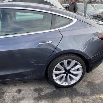 Bumper Plus Autobody - The "before" photo - a very deep scratch on the door of my model 3. Couldn't be buffed out. - Body Shops Near Me - San Diego, California Bumper Plus Autobody - The "before" photo - a very deep scratch on the door of my model 3. Couldn't be buffed out. - Body Shops Near Me - San Diego, California