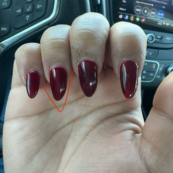 Merry Nails & Spa - Crooked ring finger clearly filed more to the left - Nail Salons Near Me - Tracy, California