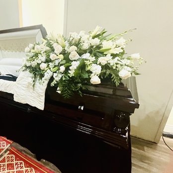 Park Merced Florist - Beautiful casket spread. Sending him off with lots of love. - Florists Near Me - Corona, California Park Merced Florist - Beautiful casket spread. Sending him off with lots of love. - Florists Near Me - Corona, California