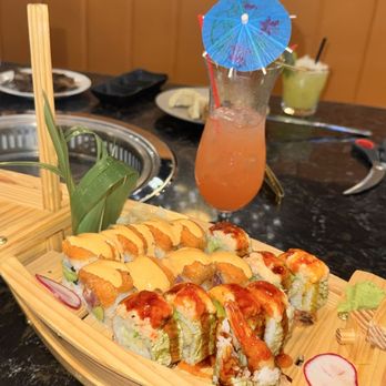 Yama Kitchen - Booth area, Yama sunset drink, spicy girl roll and double dragon roll - Korean Near Me - Pasadena, Texas