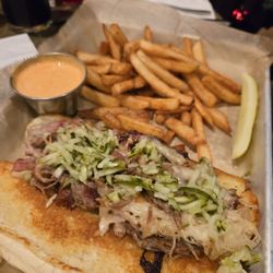 Hooligans's Artisan Meats - Polish Cubano with fries, pickle, and buffalo/ranch sauce