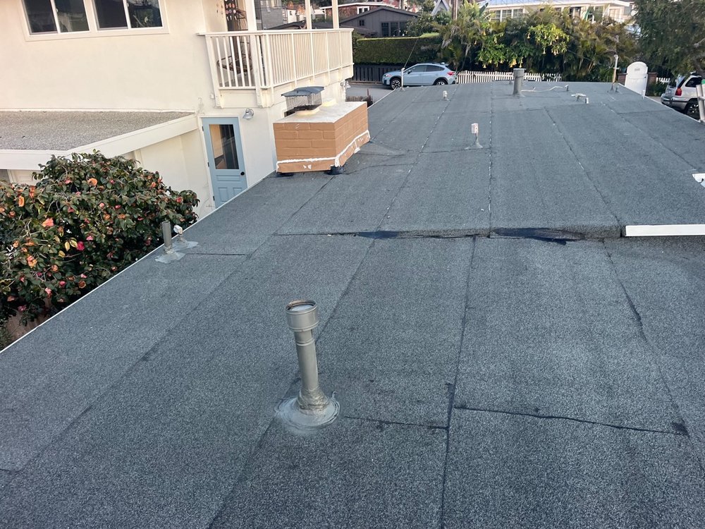 Slide of Green Leaf Roofers