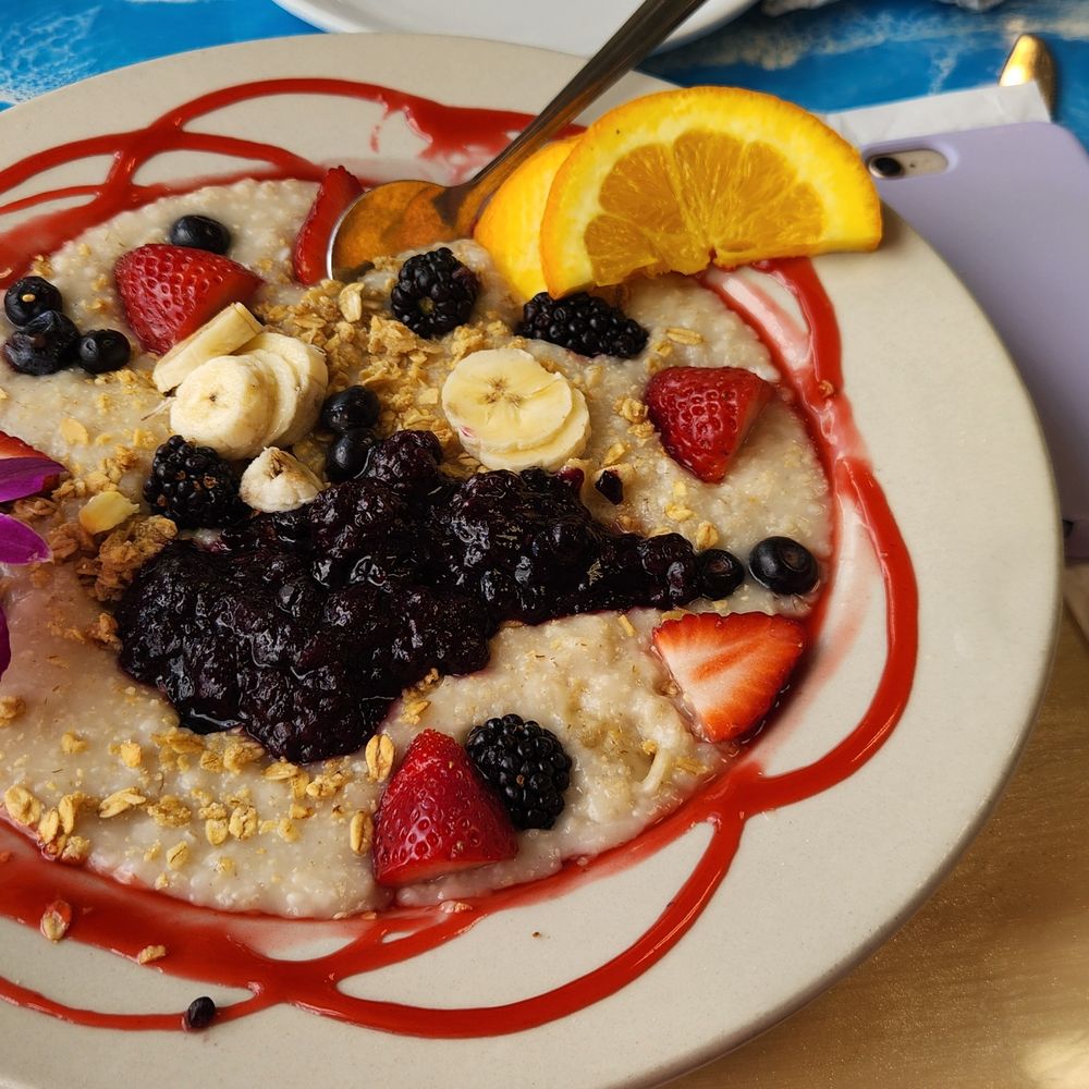 The Breakfast Cottage - Old fashioned oatmeal with al kinds of berries (I had them hold the sugar sauce. - Breakfast & Brunch Near Me - Nokomis, Florida