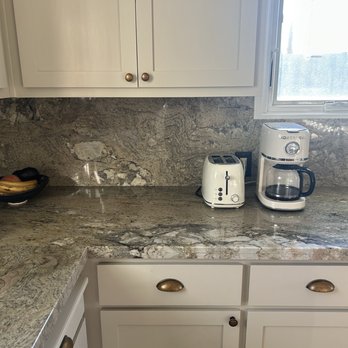 Hung Hsi Stone Center - Granite and off white cabinets with solid backsplash. - Kitchen & Bath Near Me - Pittsburg, California Hung Hsi Stone Center - Granite and off white cabinets with solid backsplash. - Kitchen & Bath Near Me - Pittsburg, California