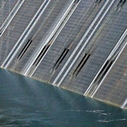 The spillways release water that act as a projections screen for the laser show The spillways release water that act as a projections screen for the laser show
